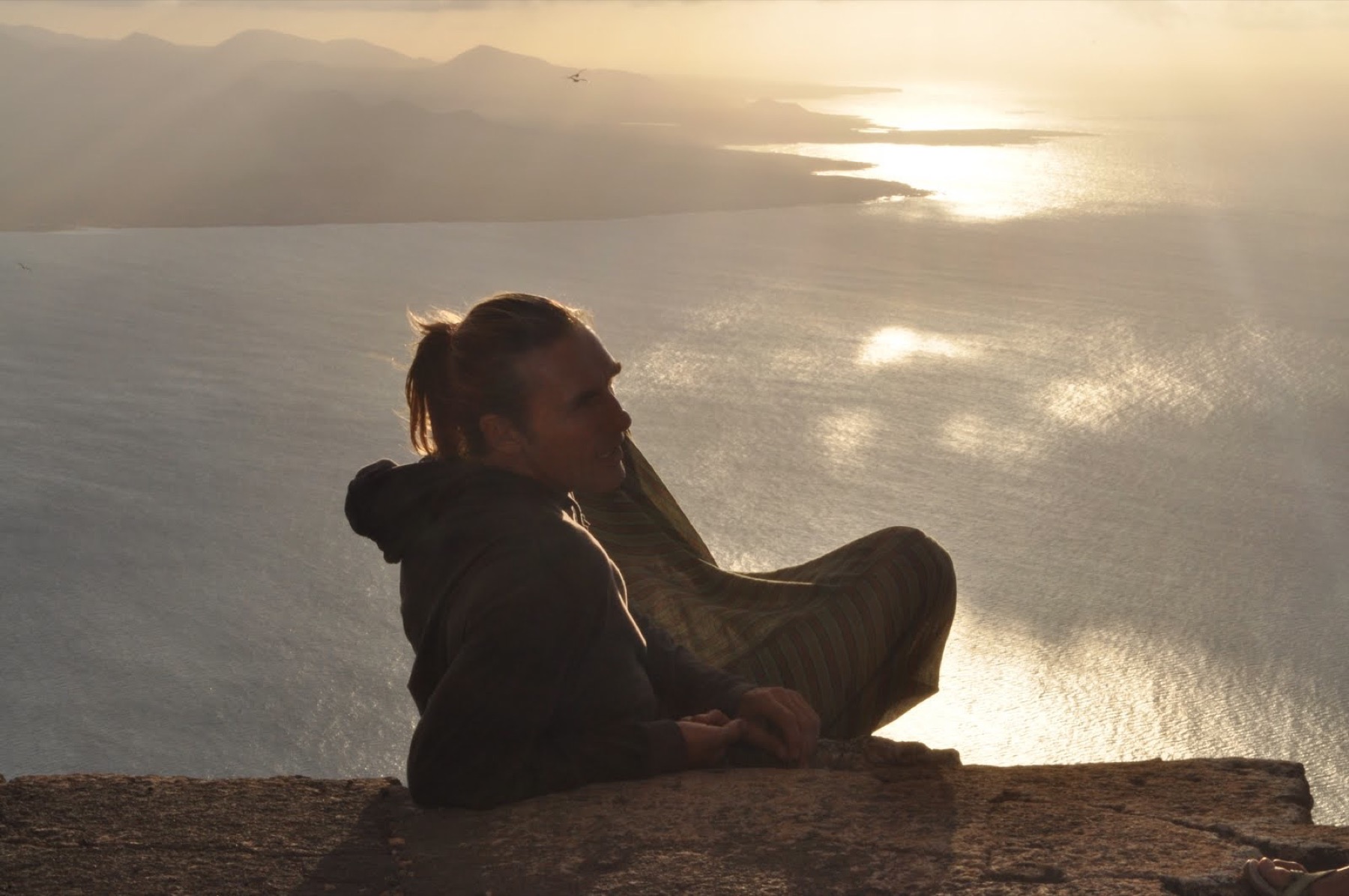 Nick Good at sunset above the ocean