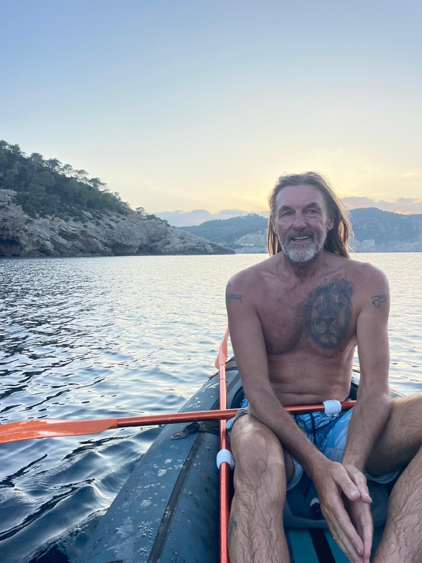 Nick Good on the water at sunset
